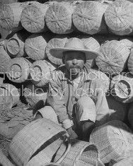A baskets vendor sitting among his wares in the Toluca Market.
