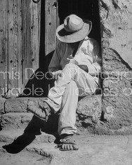 A man taking a siesta in a doorway at the Toluca Market.