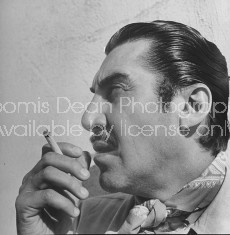 Actor, writer, director Emilio "Indio" Fernandez smoking.