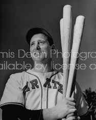 Pittsburg Pirates baseball player Hank Greenberg holding three baseball bats.