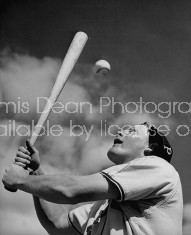 Baseball player William Wietalman playing with bat and ball.
