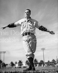 Baseball player Hank Greenberg doing calisthenics exercises.