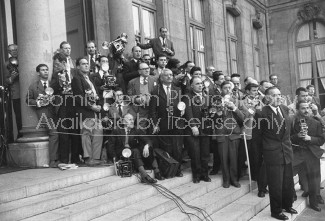 Press photographers waiting for members of the cabinet to arrive at Elysee Palace in Paris, France.