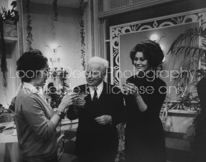 Actor/Director Charlie Chaplin (C) standing between wife Oona and Sophia Loren celebrating 77th birthday on the set of his film "A Countess from Hong Kong."