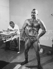 Goldgfinger Actor, Harold Sakata (L), back stage before wrestling match.