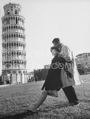 Leaning tower of  Pisa visited by Navy Lt. and wife.