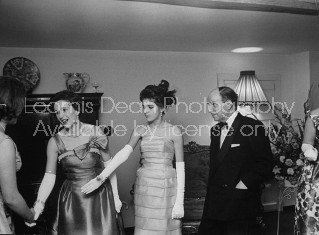 Daughter of conservative party chairman Iain Macleod,Diana Macleod (C) and her parents, receiving her guests at her coming out party.