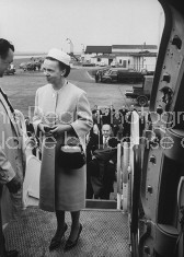 U.S. Secretary of State Dean Rusk (C, rear) and wife (Fore) boarding place at London Airport on route to Athens.