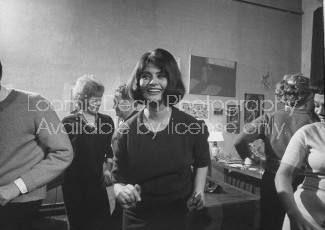 Actress Sophia Loren twisting at the Spaghetti party Life Magazine photographer Loomis Dean's Paris apartment..