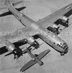 U.S. AIR FORCE B29 NEXT TO FIGHTER 245 